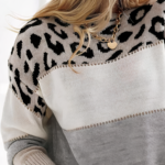 Stilvoller Pullover mit Leopardenmuster und Accessoires für modisches Outfit.